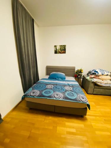 Кровать или кровати в номере Nice Apartment 25
