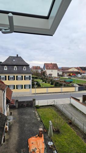 a view from a window of a building at Ferienwohnung AS 5 One & Two Bamberg - modern in ruhiger Lager mit Balkon in Hallstadt