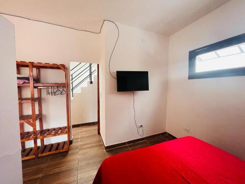 Postel nebo postele na pokoji v ubytování Mini house con sol y luz