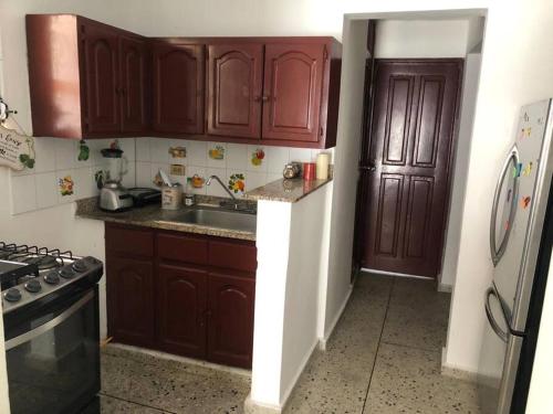 Η κουζίνα ή μικρή κουζίνα στο Hermoso Apartamento centro ciudad, wifi