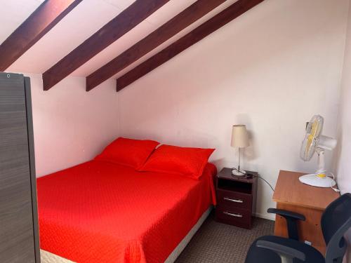 Ένα ή περισσότερα κρεβάτια σε δωμάτιο στο Cabañas Suecia