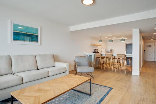 a living room with a couch and a table at Hadley Resort and Marina in Islamorada