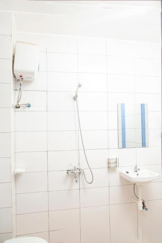 Ванная комната в Eziana palm Hotels