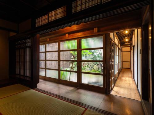 an entrance to a room with a large window at RITA Izumo Sagiura in Izumo