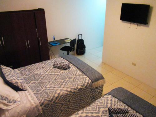 Μια τηλεόραση ή/και κέντρο ψυχαγωγίας στο Magicperu Apart Hotel