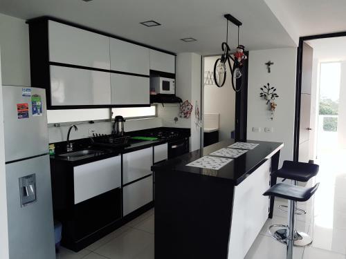Η κουζίνα ή μικρή κουζίνα στο APARTAMENTO EN SAN JERONIMO CITADELA DI AQUA