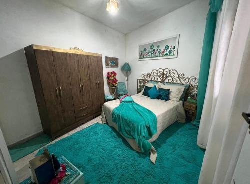 En eller flere senge i et værelse på Mansão beira mar