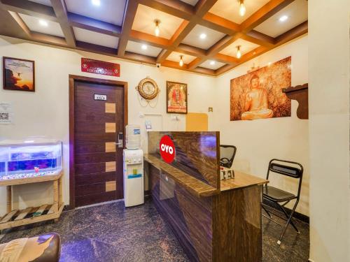 a waiting room with a stop sign on a counter at Moonlight Stays in Chennai