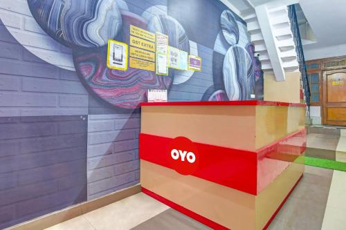 a store with ayes sign on the wall at OYO HOTEL WINNER INN in Ludhiana