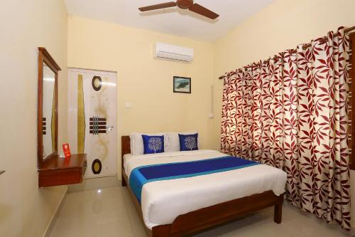 OYO Flagship 5202 Hotel Pearl Malabar房間的床