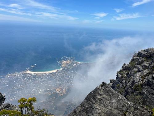 a view of a city from the top of a mountain at Dolliwarie Guesthouse in Panorama