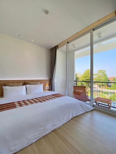 Cama o camas de una habitación en Punn Hotel Korat