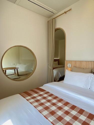 Cama o camas de una habitación en Punn Hotel Korat