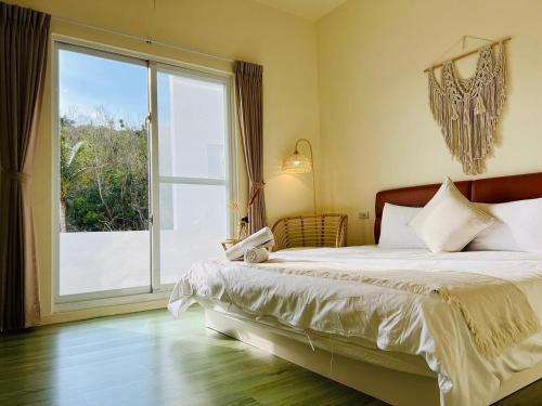 Postel nebo postele na pokoji v ubytování W24 Kenting Hostel II