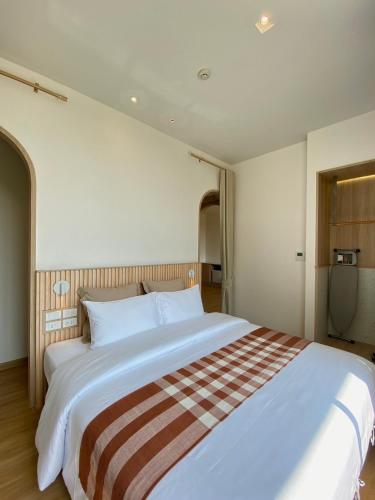 Cama o camas de una habitación en Punn Hotel Korat