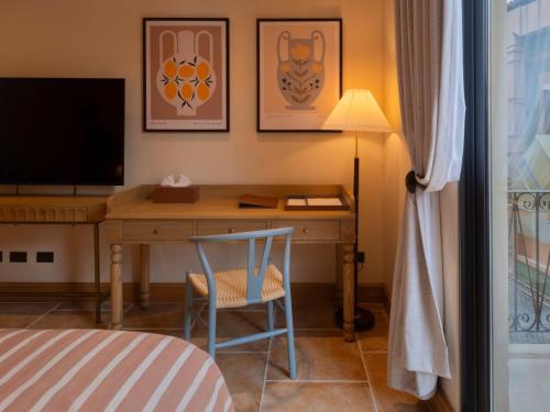 Et tv og/eller underholdning på Toscana Valley Hotel Portofino