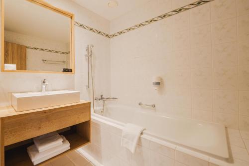 Vannituba majutusasutuses Rodinný Hotel Hubert High Tatras