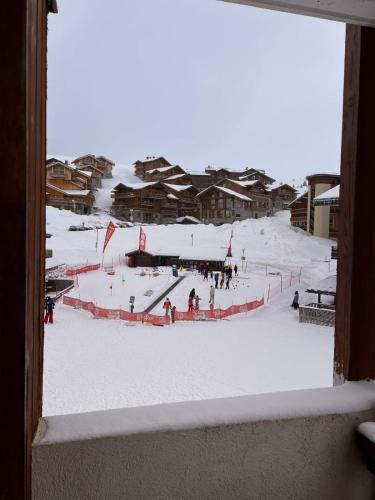 a view of a ski slope from a window at Snowflakes at La Plagne Soleil in La Plagne Tarentaise