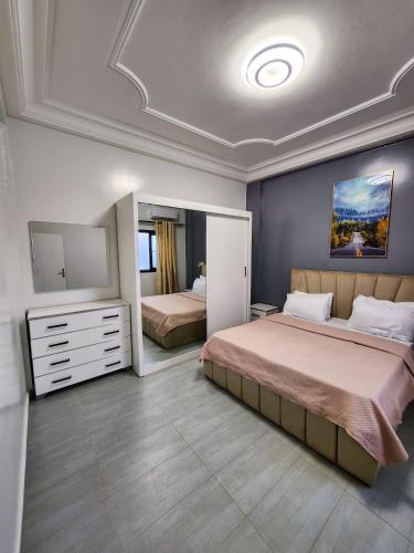 Cama o camas de una habitación en F3 Appart Les Ambassades - Point E - Dakar