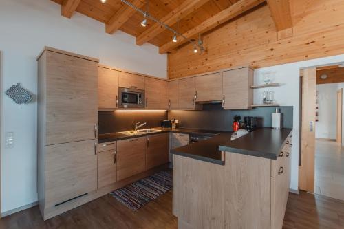 Kuchyň nebo kuchyňský kout v ubytování Appartements Hinterkerschbaum