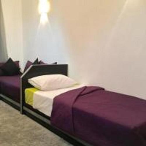 Appart Hôtel Tanger Panameにあるベッド