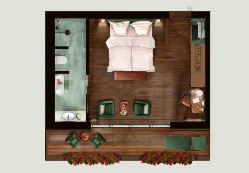 a floor plan of a room with a bathroom at Posthotel Taube in Schruns-Tschagguns