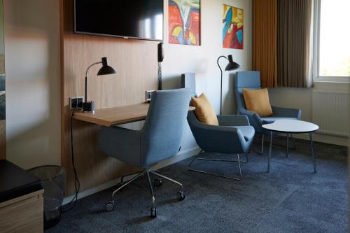 Μια τηλεόραση ή/και κέντρο ψυχαγωγίας στο Trinity Hotel og Konference