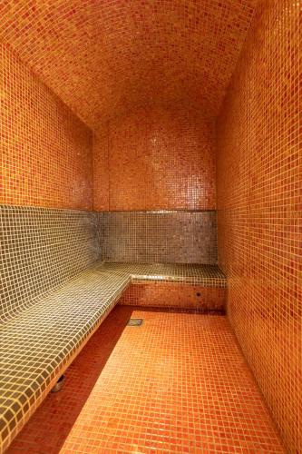 an empty room with a empty seat in a building at Broadwalk Residency in Nairobi
