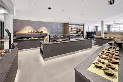 a large kitchen with a bunch of food on display at Alpenaussicht in Obergurgl