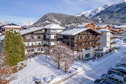 an aerial view of a hotel in the snow at Parkhotel Seefeld in Seefeld in Tirol