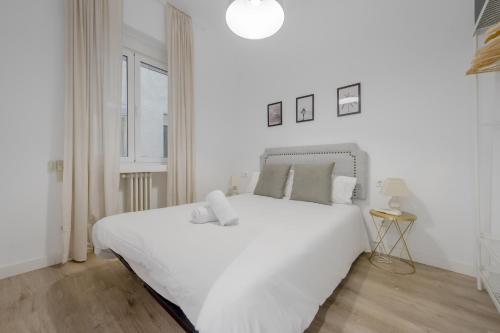 Ліжко або ліжка в номері Nuevo y comodo apartamento en el centro de Madrid