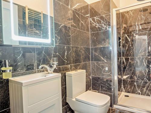 Ένα μπάνιο στο 9 Bed in Porthmadog 90740