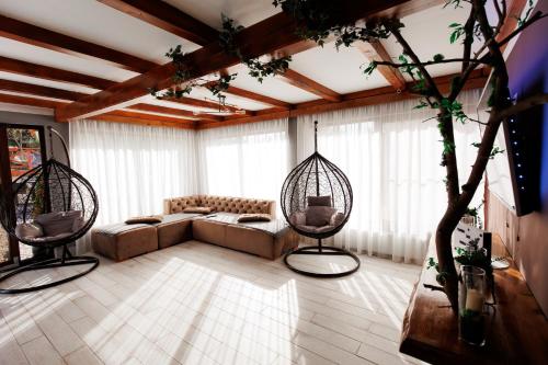 TV a/nebo společenská místnost v ubytování Cabana Dor De Munte