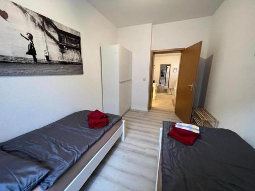 Postel nebo postele na pokoji v ubytování Pension Christianstraße