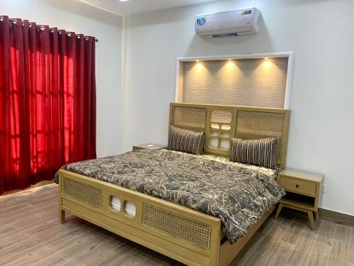 Postel nebo postele na pokoji v ubytování Park View Residency