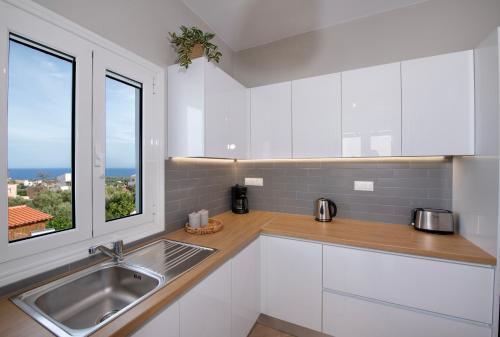 Η κουζίνα ή μικρή κουζίνα στο Plaka Paradise apartment