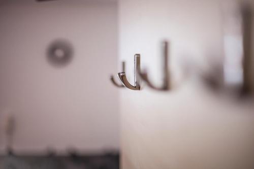 a door with a door knob in a bathroom at Conny's Apartments in Neustift im Stubaital