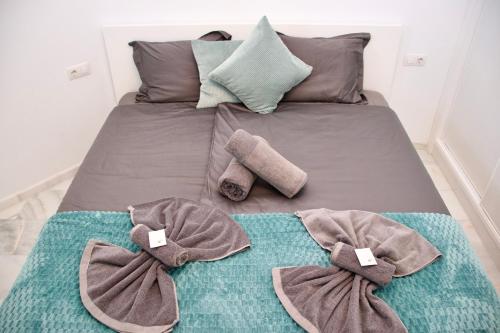 Duque Beachfront Elite 객실 침대