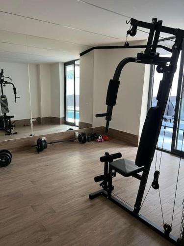 a room with a gym with two tread machines at Camelia 12 1+1 on Cleopatra with partly seaview in Alanya