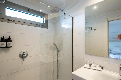 a bathroom with a shower and a sink at THB Maria Isabel - Adults Only in Playa de Palma