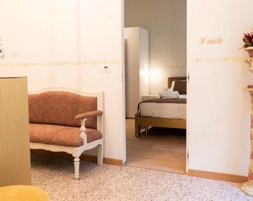 Letto o letti in una camera di PALAZZO ESSENZA
