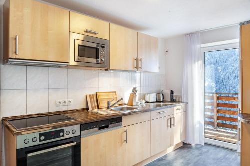 Cuisine ou kitchenette dans l'établissement Apart Elena