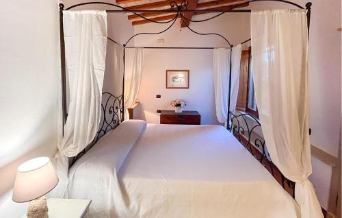 מיטה או מיטות בחדר ב-Casa Val Di Rigo