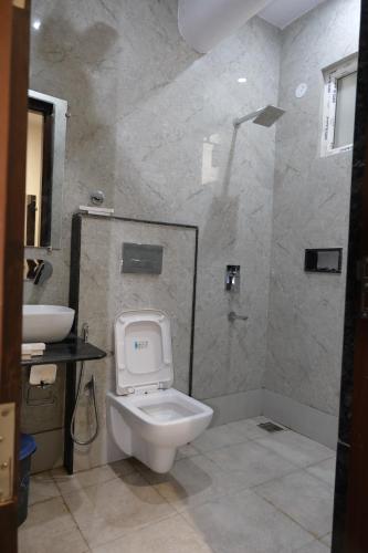 Ένα μπάνιο στο Hotel Roma Deluxe - New Delhi Railway Station