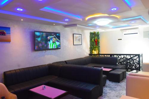 Χώρος καθιστικού στο Remzy Hotel & Suites, Olomore