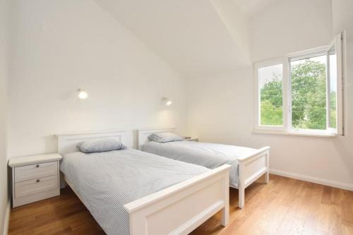 Säng eller sängar i ett rum på Villa Dalmatia Escape