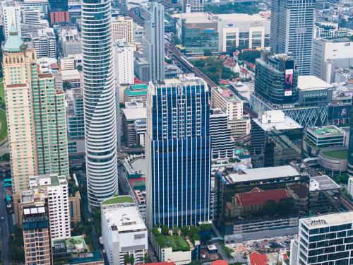 an aerial view of a city with tall buildings at Renaissance Bangkok Ratchaprasong Hotel in Bangkok