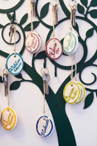 a tree with ornaments hanging on a wall at Casale la Rovere in Montalto di Castro