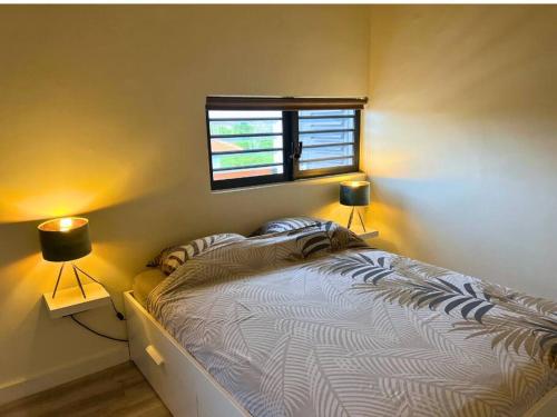 Katil atau katil-katil dalam bilik di Tropical appartment
