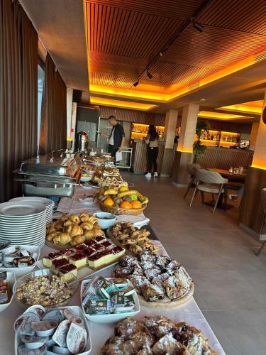 a buffet line with many different types of food at Vista Kopaonik Milmari Studio P22 in Kopaonik